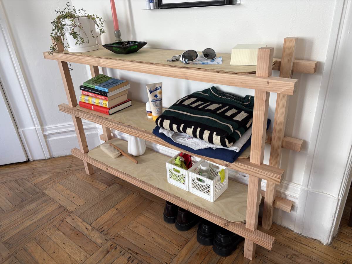 Three-tier fir shelving unit with plywood shelves and exposed joinery