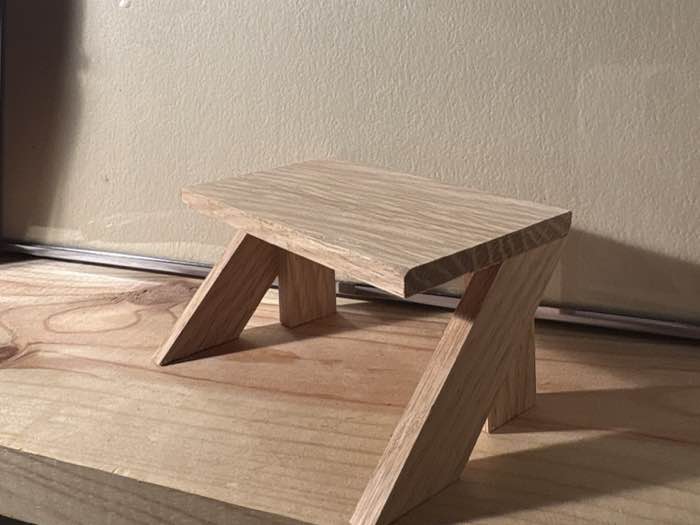 Small oak step stool with splayed legs